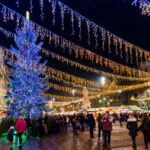 Christmas market in central Bucharest with festive lights, stalls and a large Christmas tree