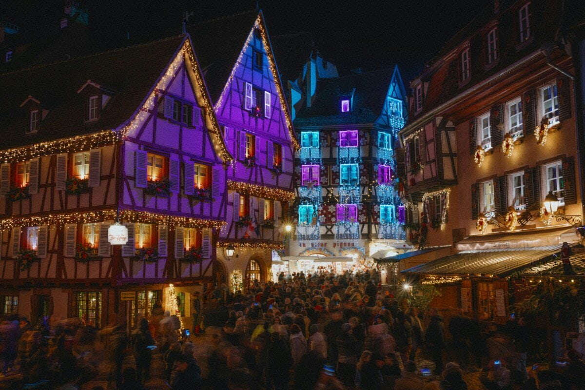 Christmas lights on traditional half-timbered buildings in Colmar