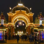Tivoli Gardens entrance in Copenhagen illuminated with Christmas lights, decorations and festive nutcracker figures