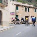 Road cyclists riding through Montuïri in Mallorca