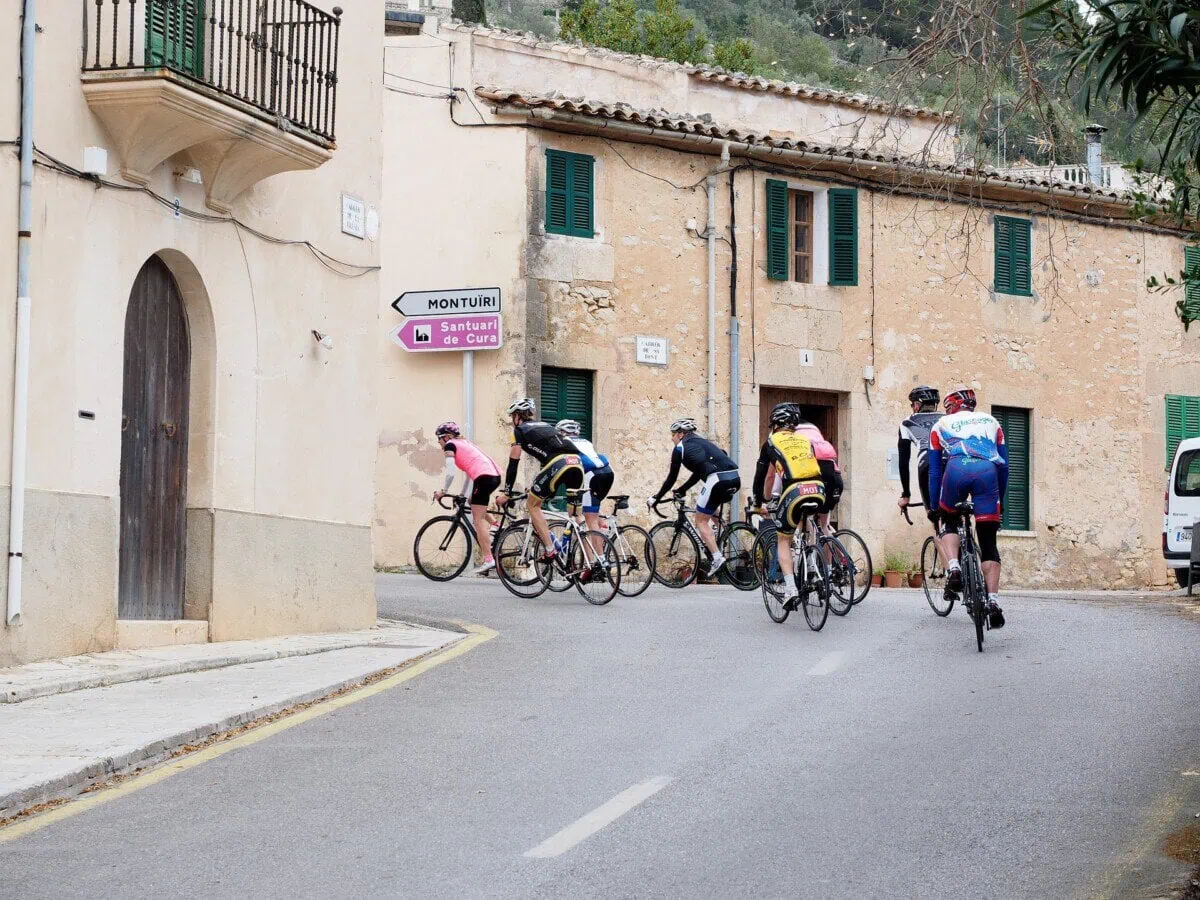Road cyclists riding through Montuïri in Mallorca