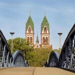 Freiburg Minster framed by the Wiwilí Bridge in Freiburg, Germany