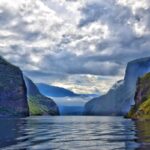 Norwegian fjord surrounded by steep mountains near Bergen