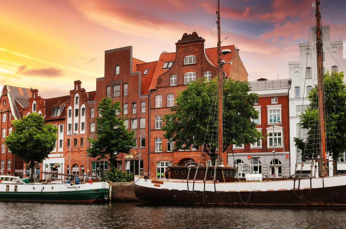 Historic waterfront buildings and boats in Lübeck