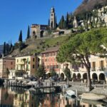 Lakefront buildings and hillside scenery in Lugano, Switzerland