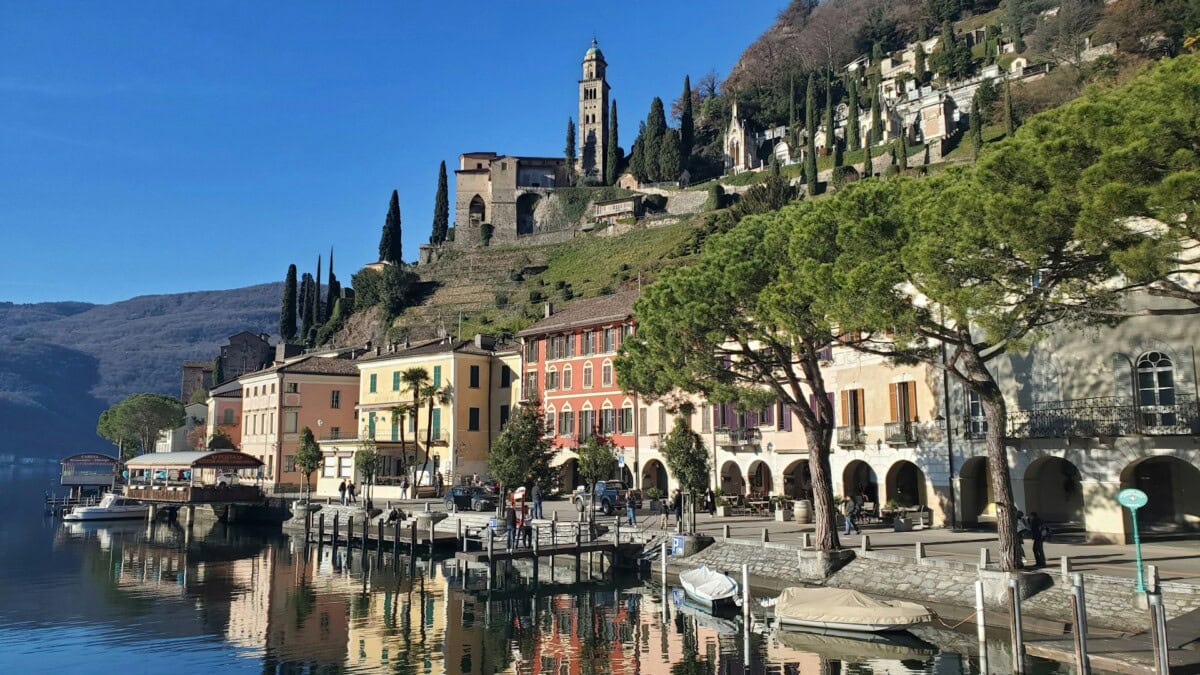 Lakefront buildings and hillside scenery in Lugano, Switzerland