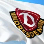 Dynamo Dresden club crest on a white flag