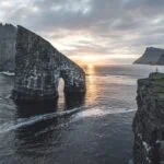 Drangarnir sea arch and cliffs at sunset in the Faroe Islands