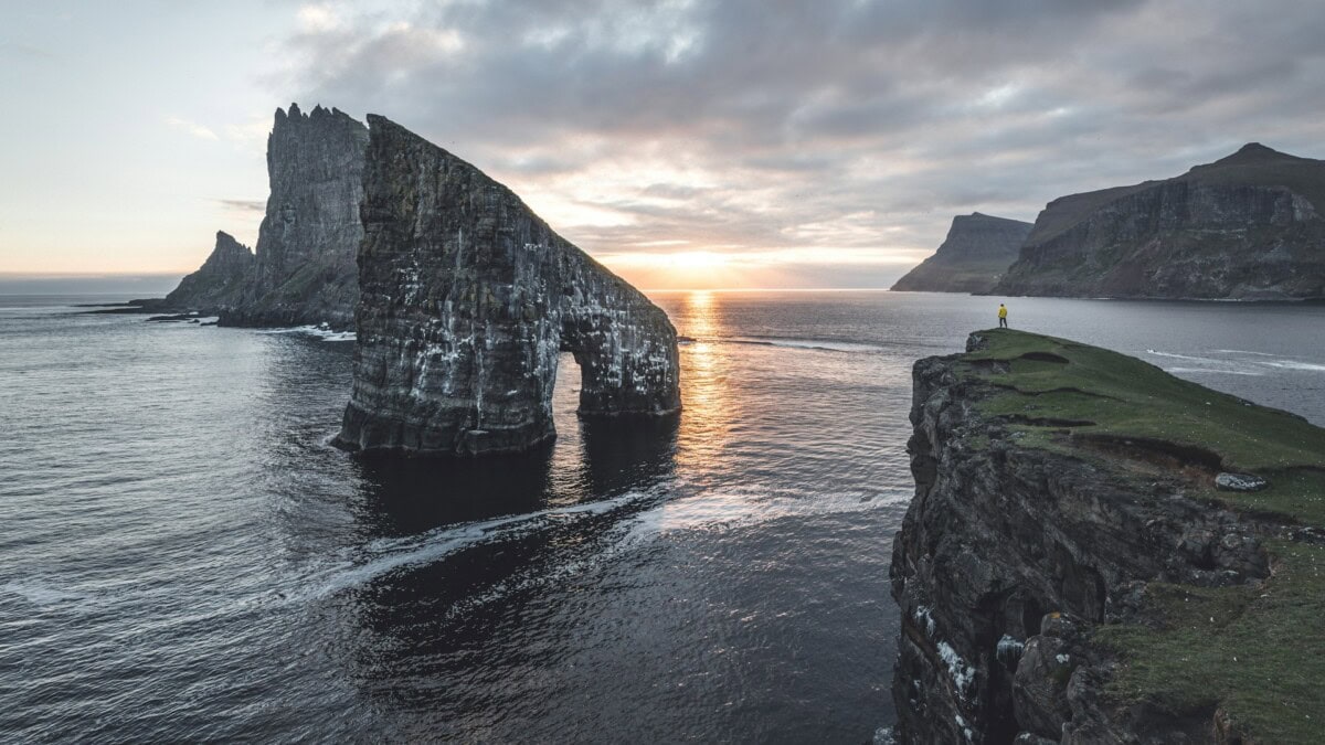 Drangarnir sea arch and cliffs at sunset in the Faroe Islands