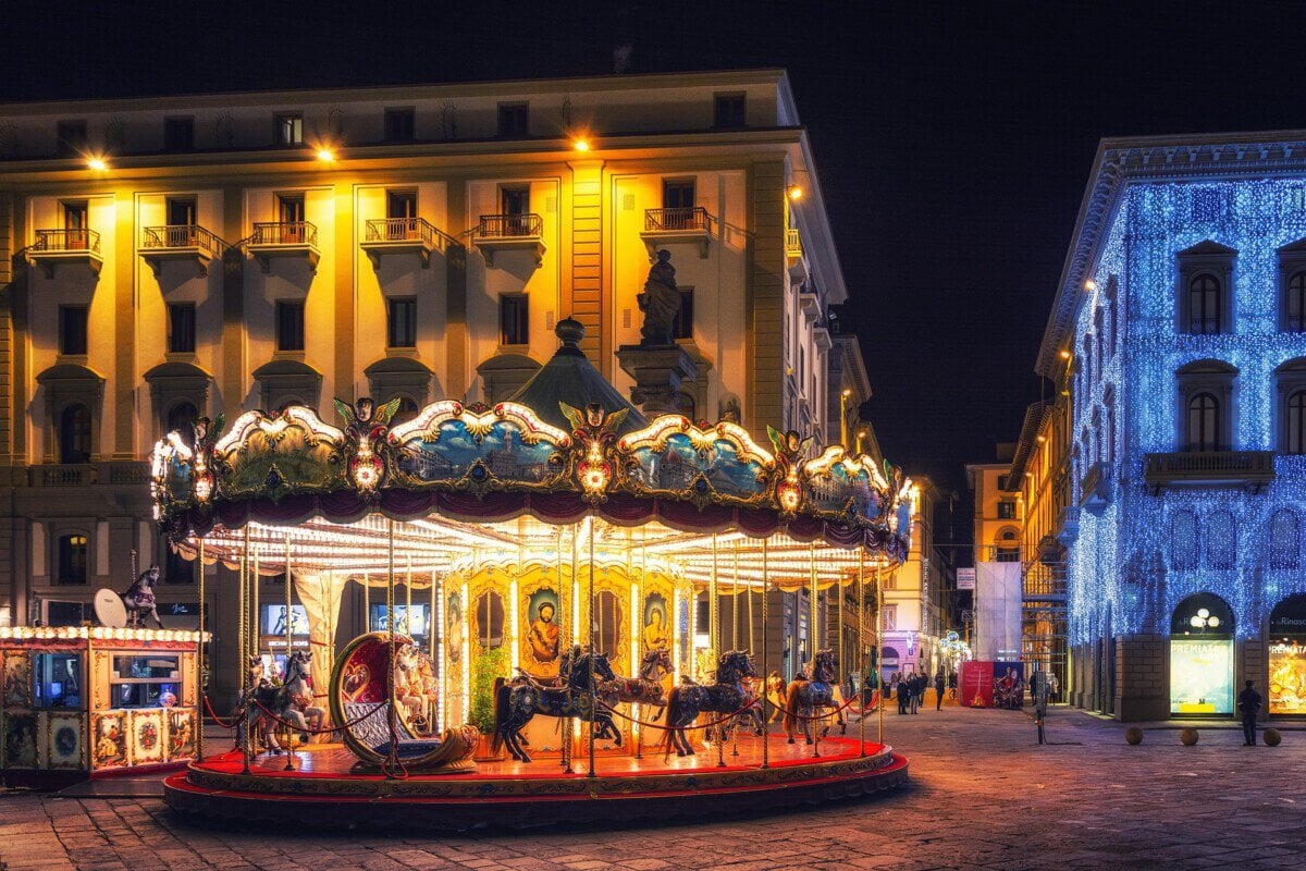 Christmas carousel and festive lights in Florence
