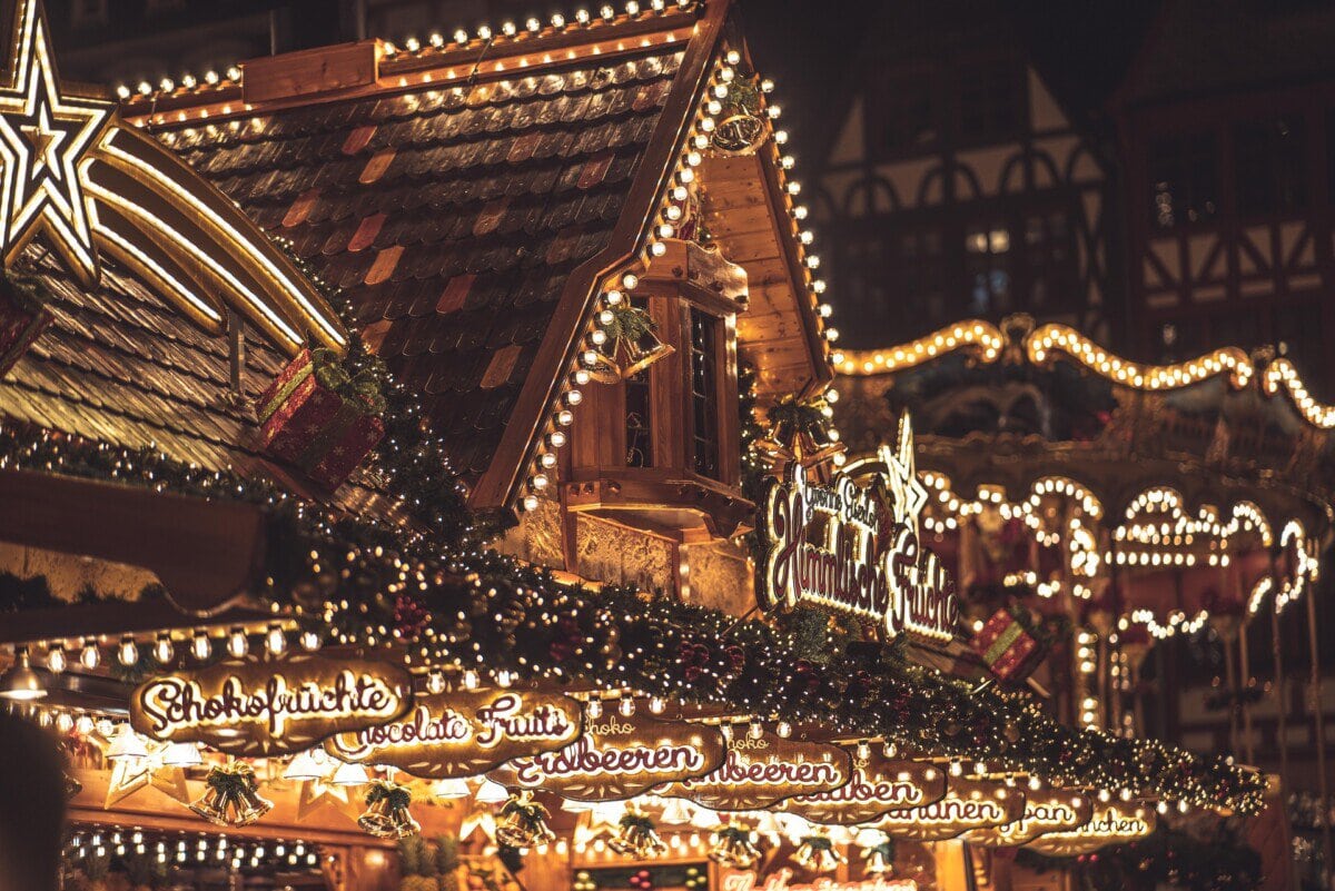 Traditional German Christmas market stall decorated with festive lights