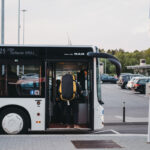 Passenger boarding a public bus at Luxembourg Airport