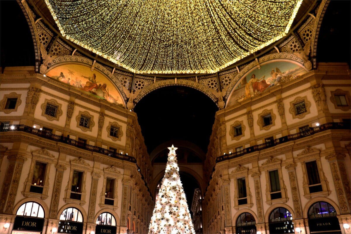 Christmas tree and festive lights inside Galleria Vittorio Emanuele II in Milan
