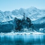 Snow-covered Bavarian Alps and alpine lake near Munich