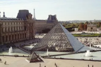 Louvre Pyramid and museum buildings in central Paris