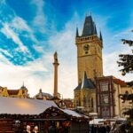 Christmas market and decorated tree in Prague Old Town Square