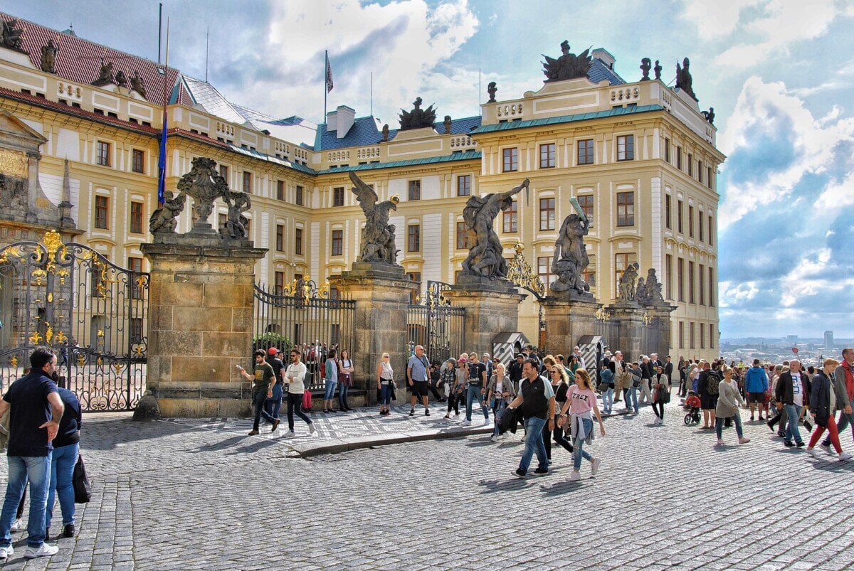Entrance to Prague Castle with visitors outside