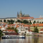 Sightseeing boat on the Vltava River below Prague Castle
