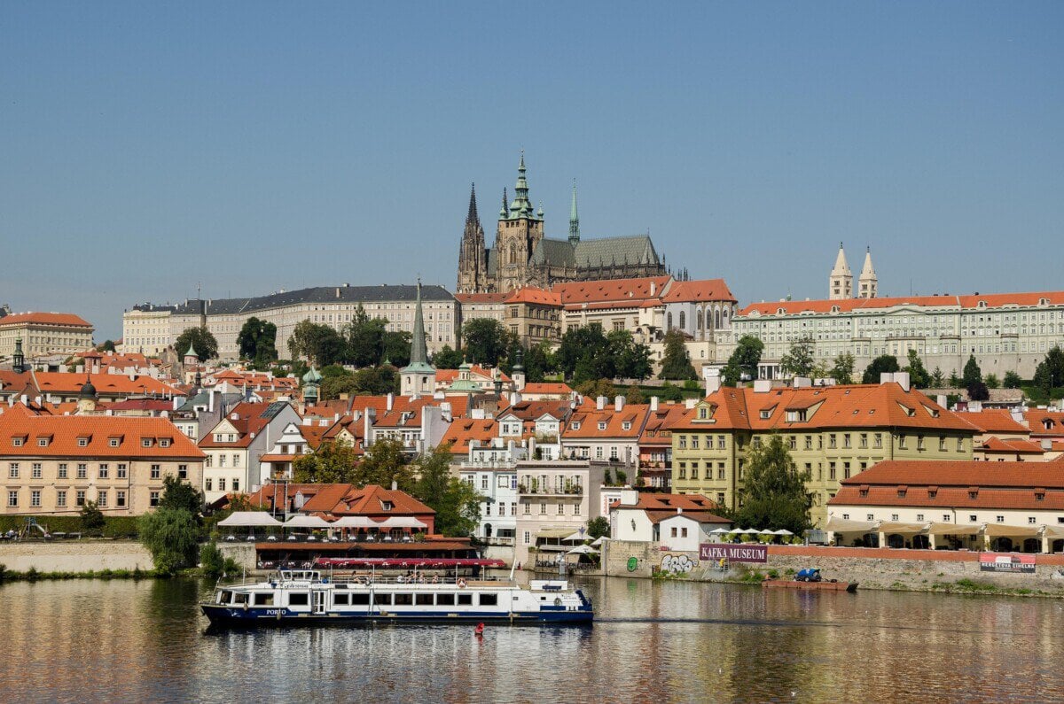 Sightseeing boat on the Vltava River below Prague Castle