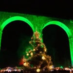 Ravenna Gorge Christmas Market beneath the illuminated railway viaduct in Germany
