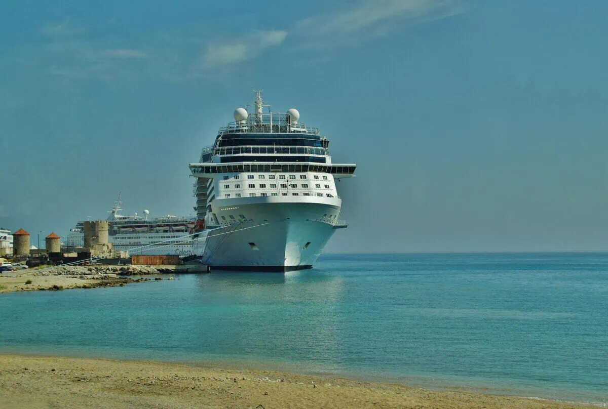 Large passenger ship docked at Rhodes port beside the old town