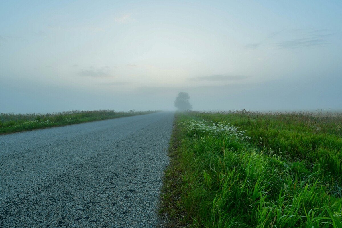 Foggy rural road in southeastern Estonia near the Saatse Boot area