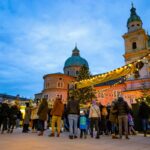 Salzburg Christmas market beside the cathedral at dusk