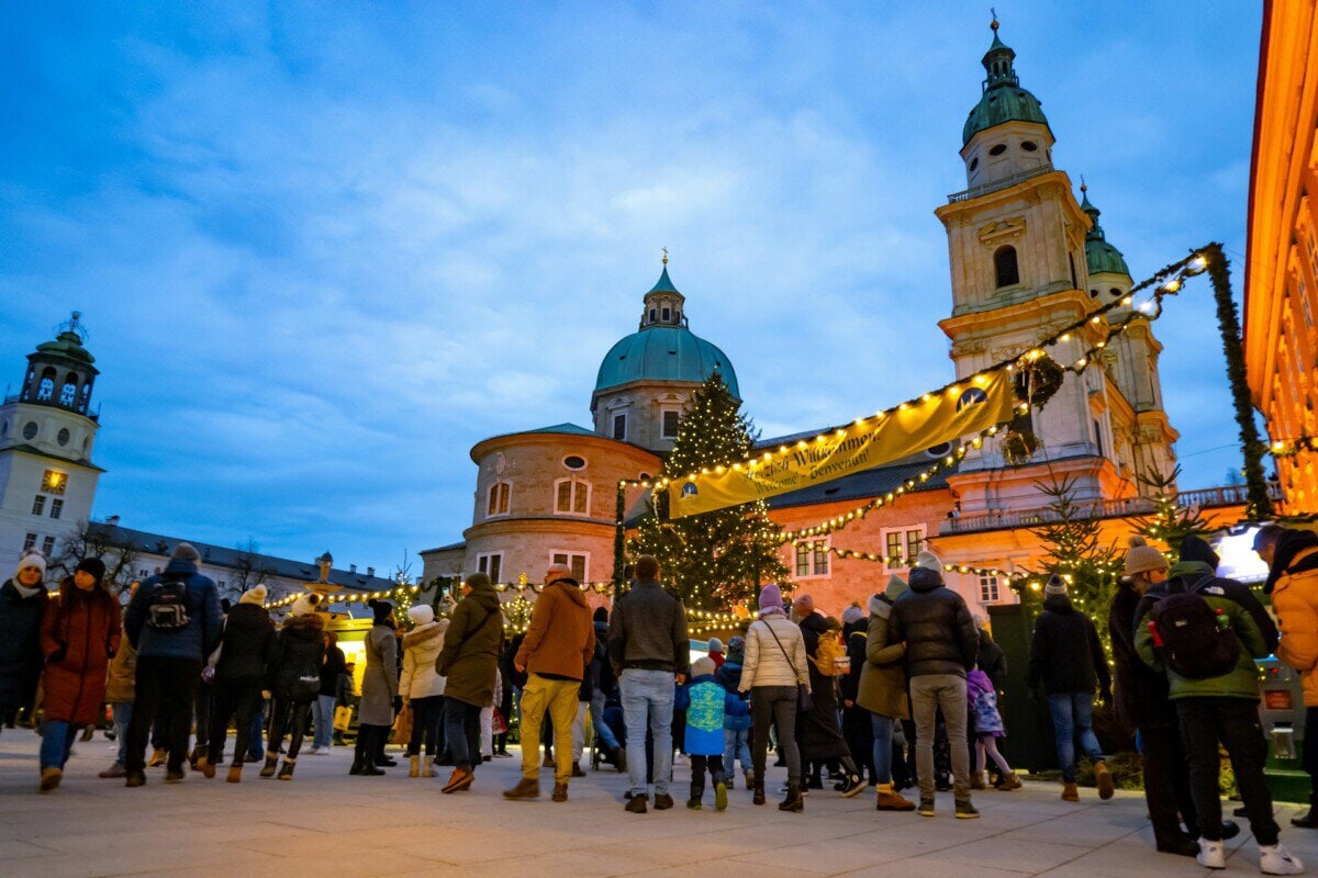 Salzburg Christmas market beside the cathedral at dusk