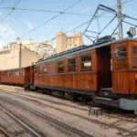 Vintage wooden Sóller train on the railway in Mallorca
