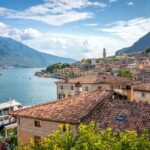 Limone sul Garda waterfront, ferry and mountains beside Lake Garda