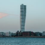 Turning Torso skyscraper rising above the waterfront in Malmö Sweden
