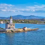 Lighthouse on a small island off the coast near Olbia