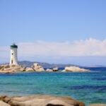 Lighthouse and turquoise sea near Palau in Sardinia