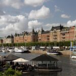 Stockholm waterfront with boats moored beside historic buildings on Strandvägen