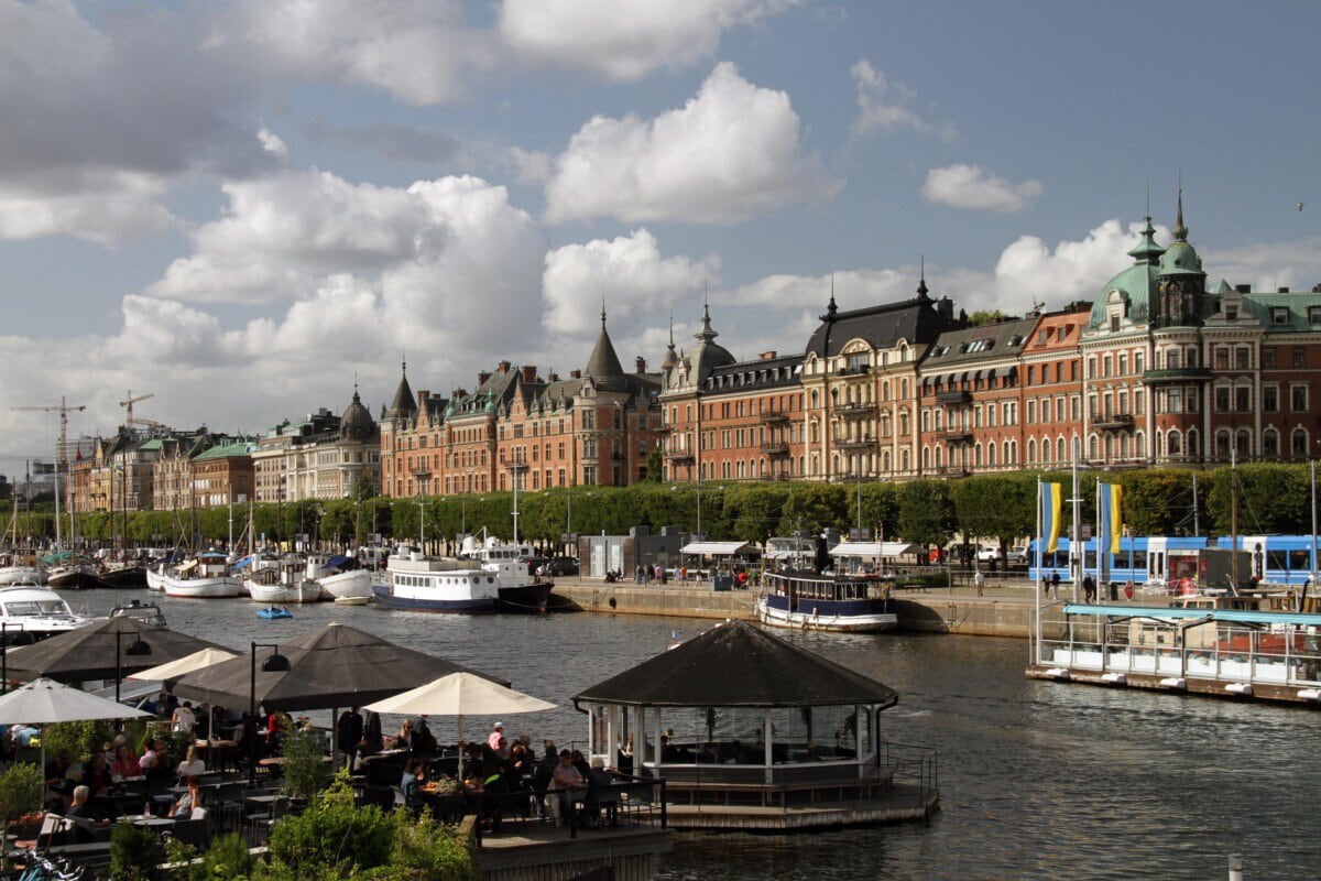 Stockholm waterfront with boats moored beside historic buildings on Strandvägen