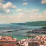 Panoramic view of Trieste port, city rooftops and the Gulf of Trieste