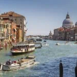 ACTV vaporetto travelling along the Grand Canal in Venice