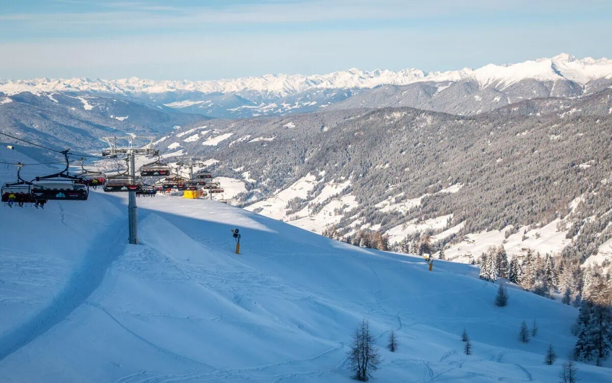 Snow-covered ski slopes and chairlifts in the Dolomites