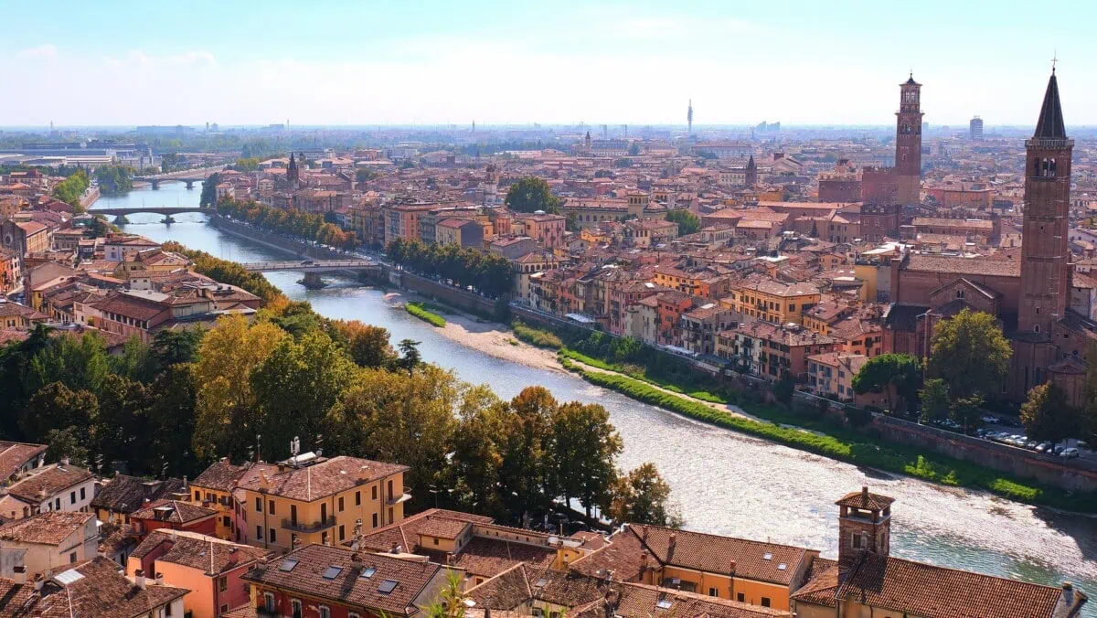 Panoramic view of Verona rooftops, church towers and the River Adige